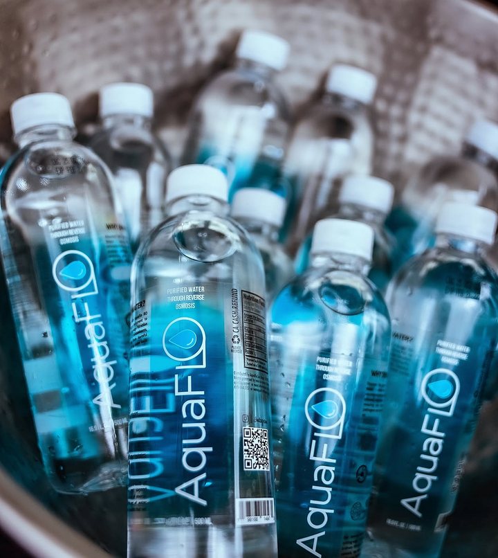 AquaFlo bottles packed into an ice bucket